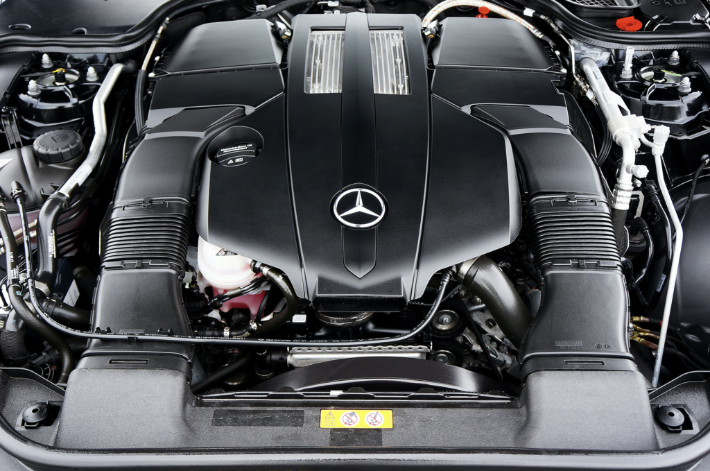 Mercedes engine bay with twin air intake.